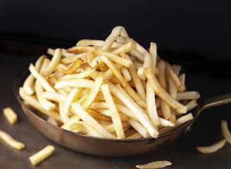 pan of rustic golden french fries