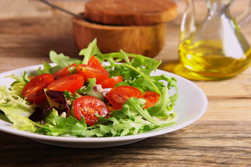 Freshly made salad with rocket and cherry tomatoes
