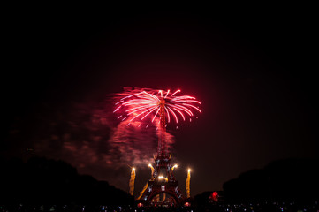 BASTILLE DAY 2018 in Paris, France on July 14th, 2018. Fireworks and the Eiffel Tower on the French National Day in Paris, France on July 14th, 2018, from Field of Mars (Champ de Mars)