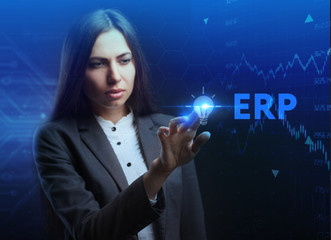 The concept of business, technology, the Internet and the network. A young entrepreneur working on a virtual screen of the future and sees the inscription: ERP