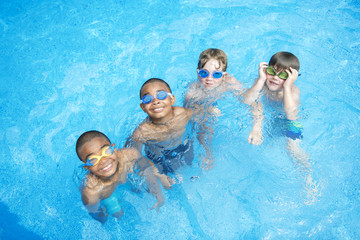 Children in outside swimming pool