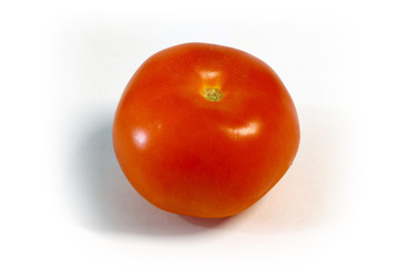 ripe tomato on white background