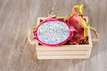 Dragon fruit on wooden floor