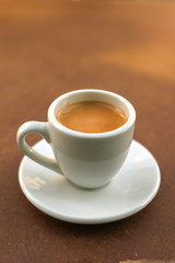 coffee espresso isolated on wooden table
