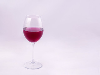 glass of red wine on white background