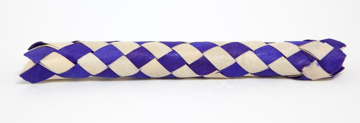 Purple and white bamboo finger cuffs.