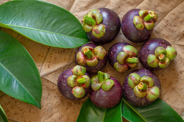Mangosteens Queen of fruits on wooden table