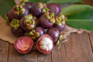Mangosteens Queen of fruits on wooden table