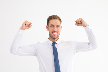 Happy attractive business man pumping fists. Guy celebrating achievement and looking at camera. Success concept. Isolated front view on white background.