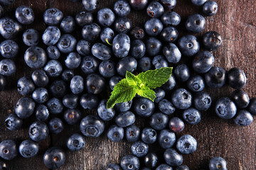 Blueberries  on a rustic table, Healthy eating and nutrition concept.