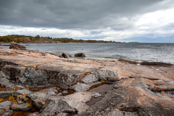 Beautiful seascape, the stone coast of the sea on the islands of Finland. The nature of Northern Europe