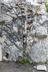Gray surface of marble stone with striped streaks.