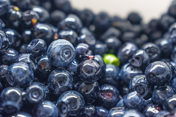 Blueberry berries closeup background. Antioxidant organic superfood concept. Healthy eating and nutrition