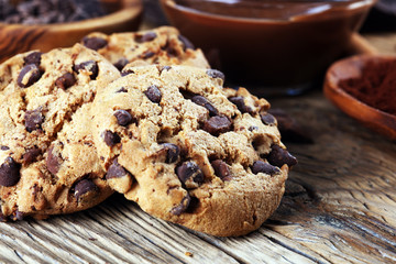 Chocolate cookies on table. Chocolate chip cookies shot with chocolate