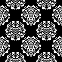 White flowers on black background. Ornamental seamless pattern