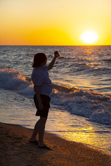 Fototapeta premium Teen with action camera on the sea.