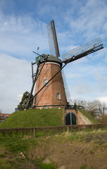 Fototapeta na wymiar A windmill in Holland