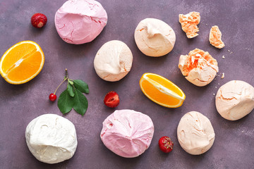 Colorful meringues on a beautiful background. The view from the top,flat lay.