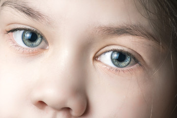 Naklejka premium Beautiful eyes of a young girl