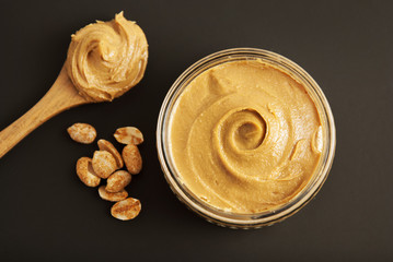 Peanuts and Fresh Peanut Butter Isoalted Black Background Protein Super Food Snack