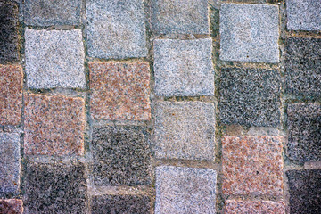 Square stone paving slabs.