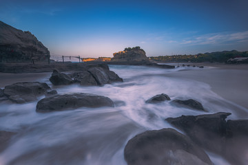Beautiful beach in long exposure shot photography; Java, Indonesia