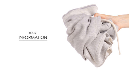 Crumpled gray shorts in a hand pattern on a white background isolation