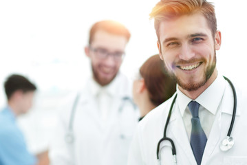 Fototapeta premium Portrait of friendly male doctor smiling