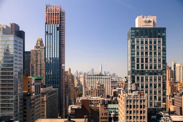 Fototapeten New York City Manhattan cityscape of buildings at midtown on sunny day © littleny