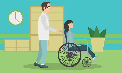 Woman in a wheelchair to be released from the hospital. The doctor is taking the patient in a wheelchair in the hospital