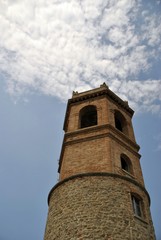 Obraz premium small village civic tower with clock