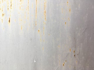 Stains of gray paint, rust, scratches abstract texture background