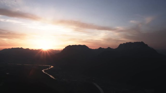 4k time lapse of a sunrise over a beautiful mountain range.