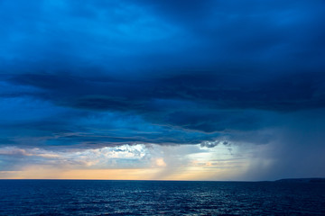 Sea, sky and dark cloud