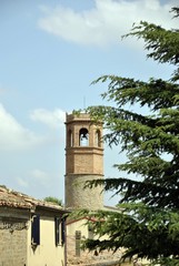 Fototapeta na wymiar small village civic tower in the italian countryside