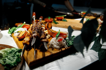 fried pork meat on skewers