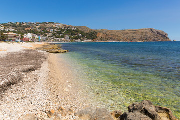 Clear blue sea Xabia Spain at Platja de la Grava beach located south-east of Denia also known as Javea