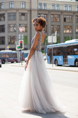 Obraz premium Sexy african woman in white long dress