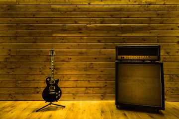 Music studio with guitar and amplifier