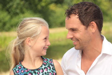 Father and daughter outside