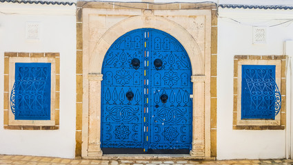 Fototapeta premium Ornate blue door. Sidi Bou Said, Tunisia