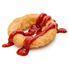 Crispy deep fried onion or Calamari ring with ketchup isolated on white background