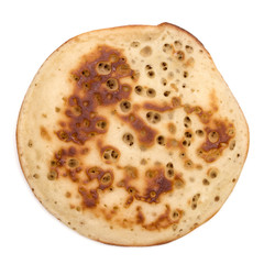 One pancake isolated on white background cutout. Top view.