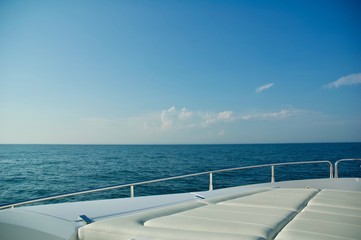 Fototapeta na wymiar Luxury Yacht Cruising the Ocean in Newport, Rhode Island.