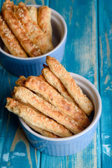 Cottage cheese sticks with oatmeal and sesame flakes