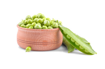 Fresh green peas in a wooden bowl on a white background. isolated