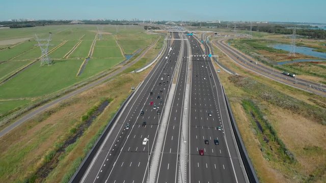 Aerial view of a wide hightway with reversible lanes