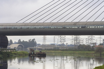 Sao Paulo, Brazil, June 01, 2008. Pollution of Pinheiros river by sewage and trash of city in a rain day