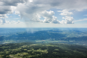 soft focus mountain summer green field beautiful nature landscape field from above panoramic view with horizon lane in summer bright colorful day time