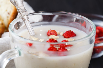 berry smoothie with oatmeal in a glass, healthy eating diet concept